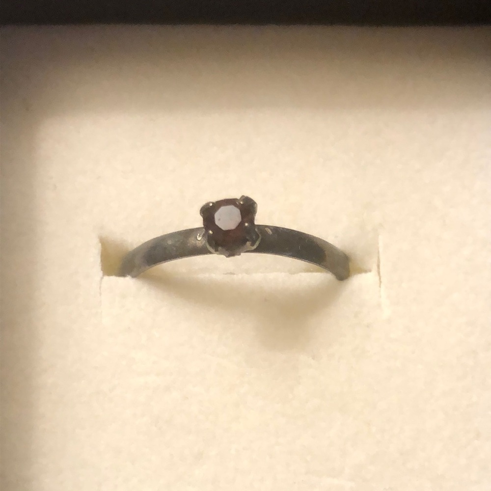 Elegant Silver Ring with Purple Gemstone
